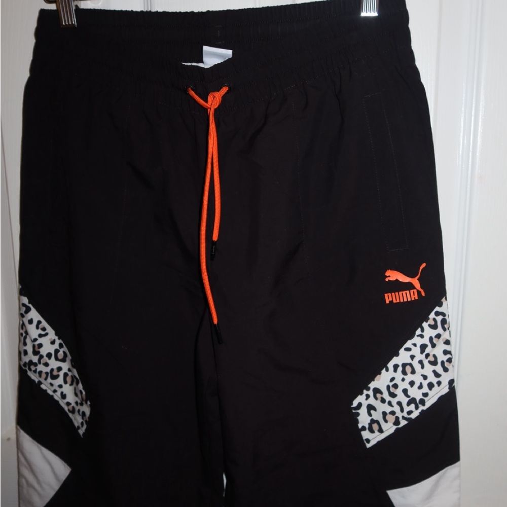 Puma women’s Black pants with Orange and White Accents